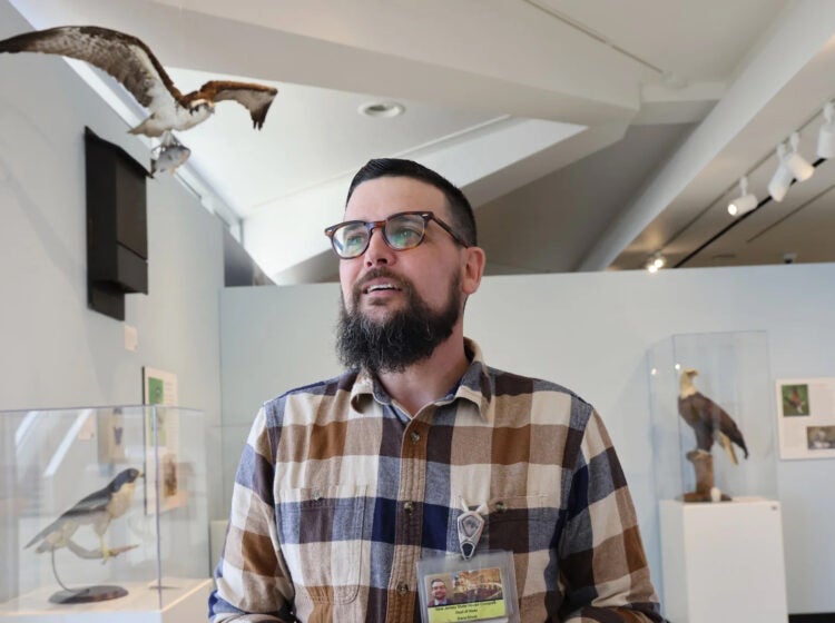 Dana Erhet posing for a photo inside the museum