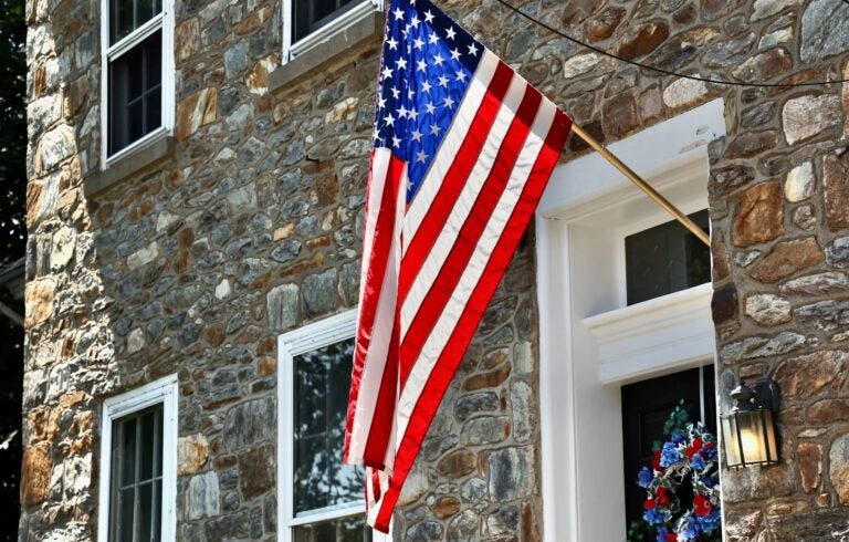 2025-07-24-e-lee-morrisville-pa-flag-file An American flag hanging