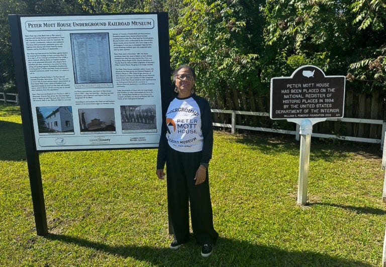 2025-09-12-k-burns_Linda-Shockley-president-Lawnside-Historical-Society-New-Jersey Linda Shockley smiles outside the Peter Mott House