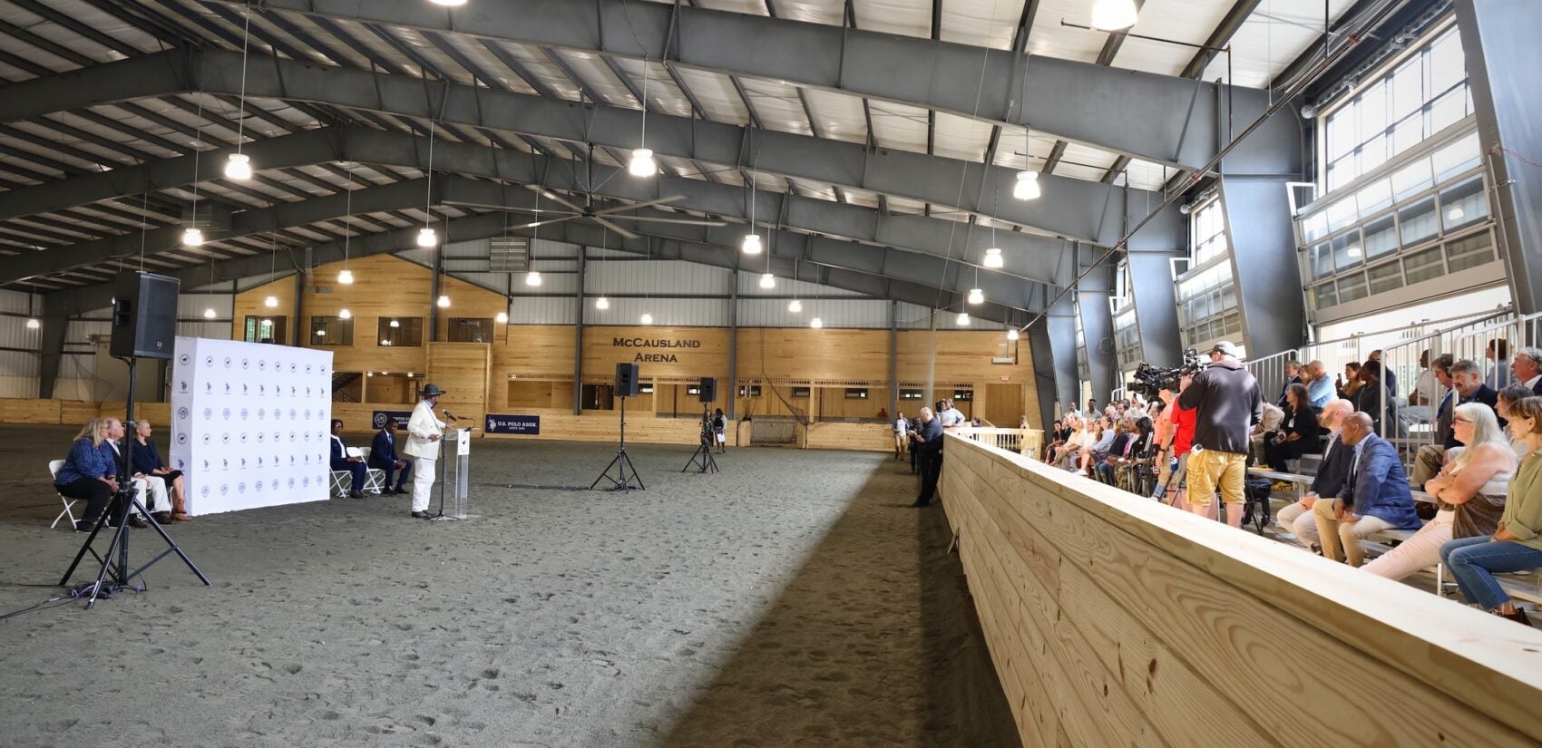 2025 09 24-e lee-philadelphia fairmount park chamounix stables-new arena crowd People sitting in the stands watching the ribbon-cutting ceremony