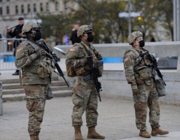 President Trump has threatened to send federal troops to crime-ridden cities. Could Philadelphia be next? Here, a photo of the Pennsylvania National Guard stand watch near City Hall in 2020. (AP Photo/Michael Perez)