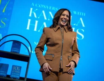 Former Vice President Kamala Harris exits the stage after the first stop of her book tour