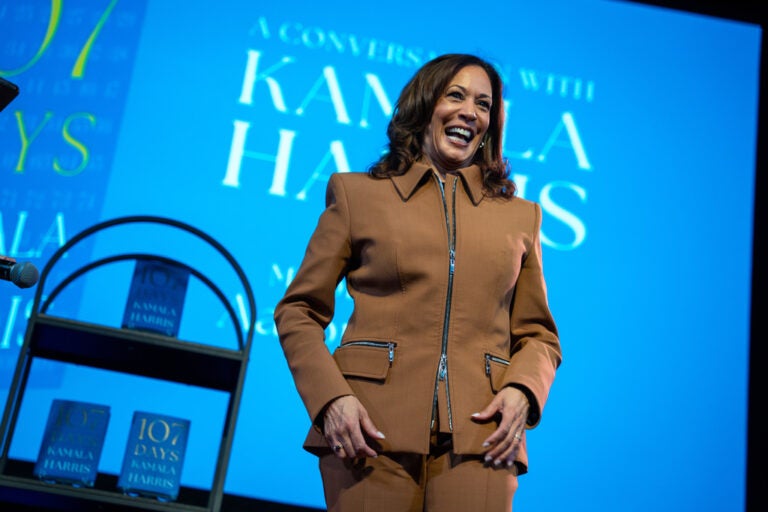 Former Vice President Kamala Harris exits the stage after the first stop of her book tour