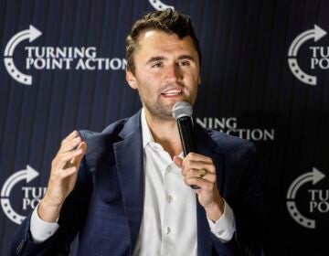 FILE - Charlie Kirk speaks during a town hall meeting (AP Photo/Jeffrey Phelps, File)