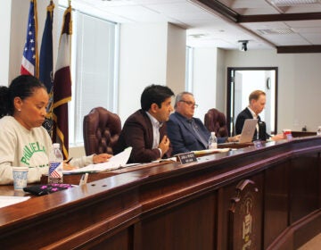 Montgomery County Commissioners sit behind the commission bench