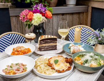 A table filled with many plates of food