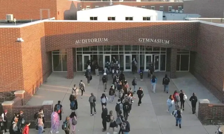 Students entering the school building