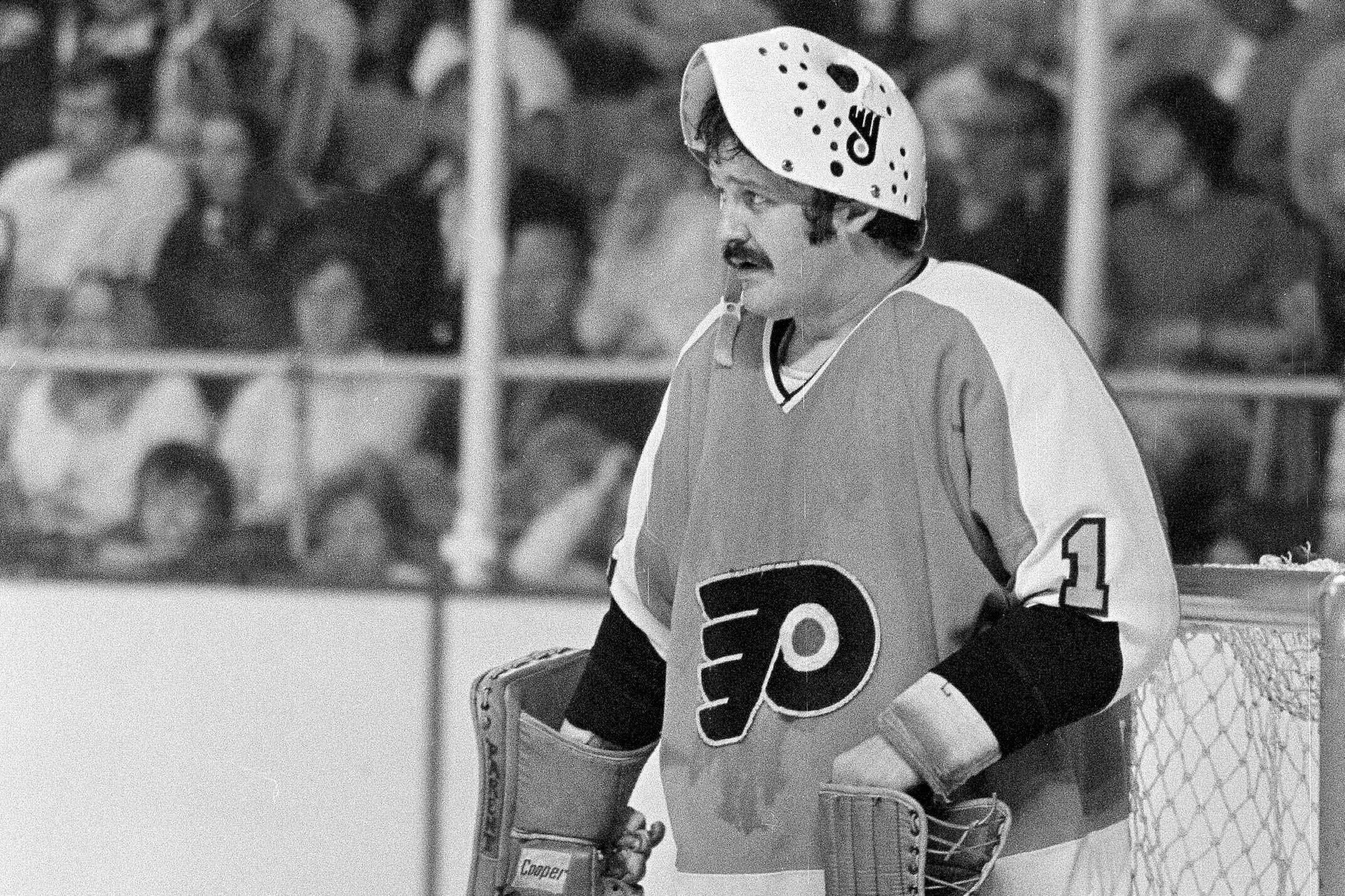 Bernie Parent Philadelphia Flyers legendary goaltender in his iconic mask and uniform