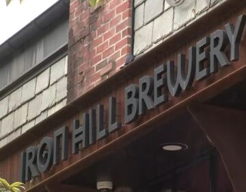 A sign for Iron Hill Brewery