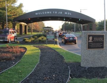A sign at the entrance of the base welcomes people driving in.