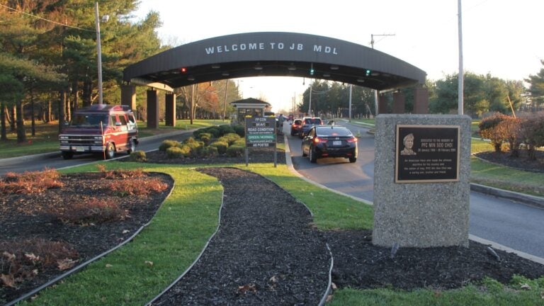A sign at the entrance of the base welcomes people driving in.