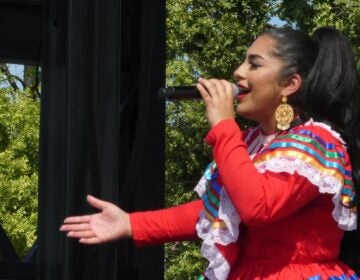a singer performs at the Mexican Independence Day Festival