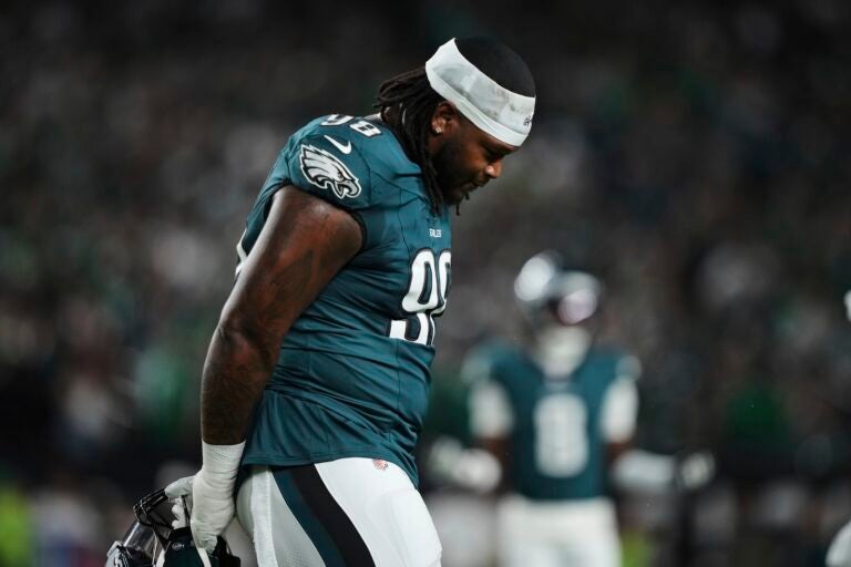 Philadelphia Eagles defensive tackle Jalen Carter walks off the field after being disqualified for unsportsman like conduct before an NFL football game against the Dallas Cowboys Thursday, Sept. 4, 2025, in Philadelphia.