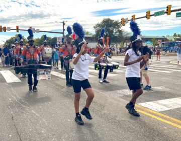 A drumline marches through South Philadelphia