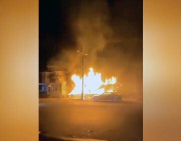 A fire burns through homes in Trenton, New Jersey