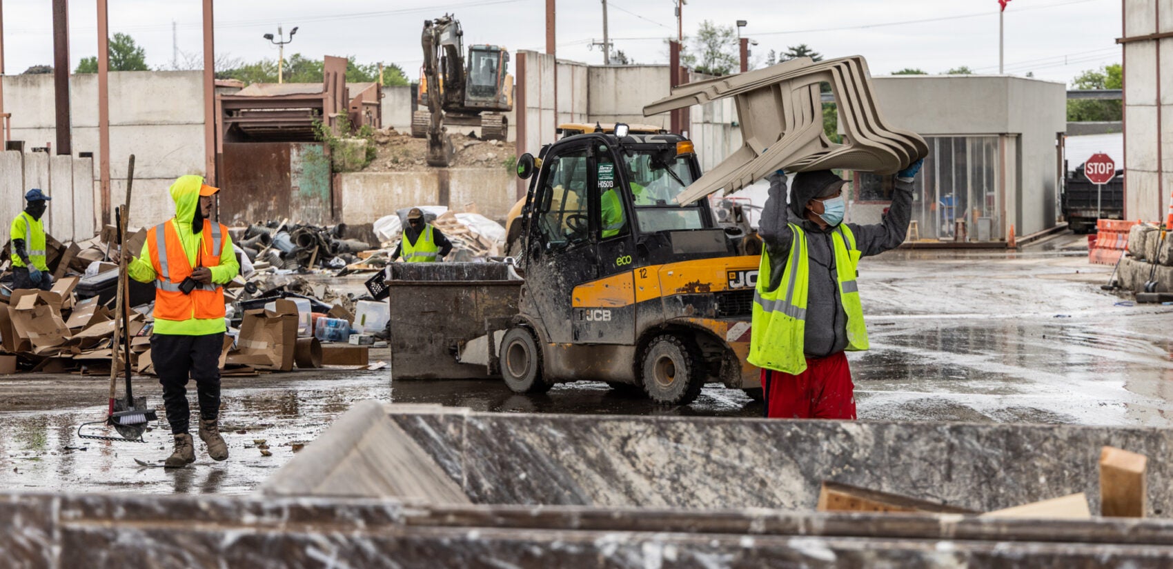 10 08 2025 k paynter burns recycling center_-5 Workers moving recycling items