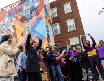 Ribbon cutting ceremony for We Are All Bound Up Together mural