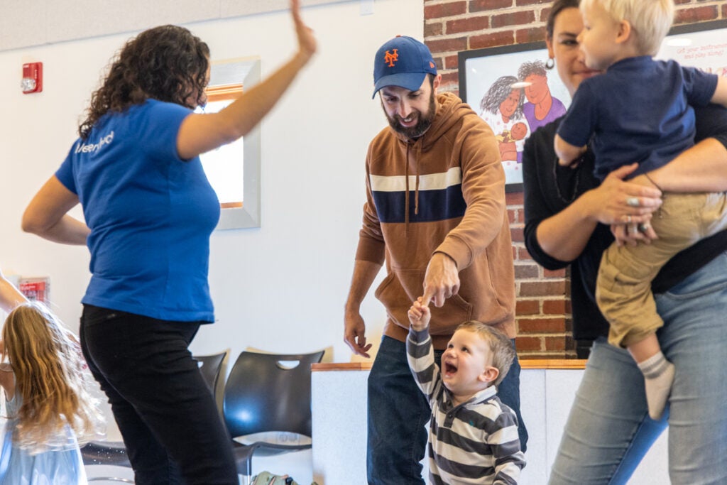 Jason Krane and Wyatt dance with Norah Wasden at a class for young children