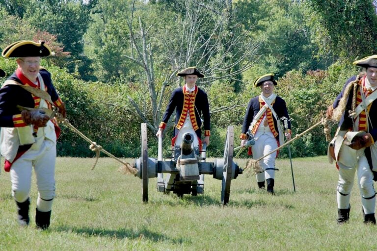 Revolutionary War reenactors portray Patriots