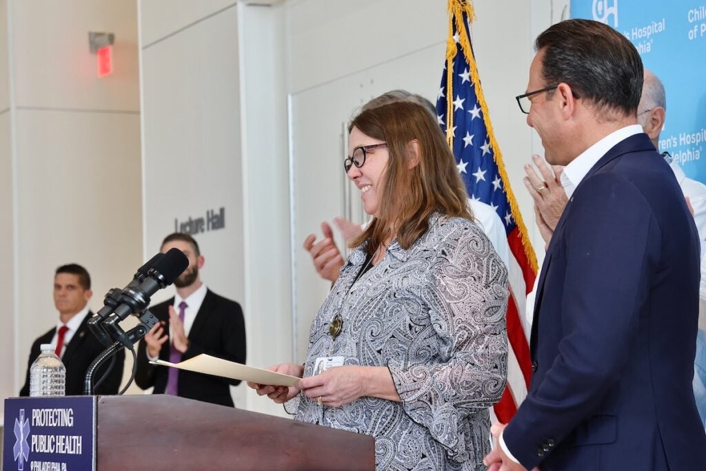 Governor Josh Shapiro introducing Dr. Charlotte Moser