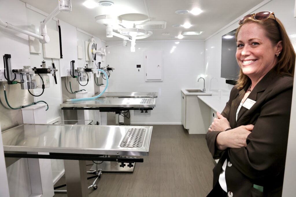 Dr. Kirsten White, a professor at the Shreiber School of Veterinary Medicine, stands in Rowan's Shelter Medicine and Community Engagement mobile unit