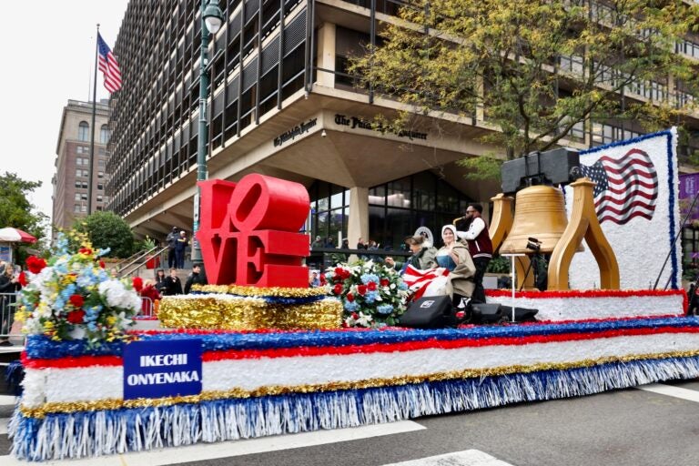 Jazz saxaphonist Ikechi Onyenaka performs from a Historic Philadelphia float