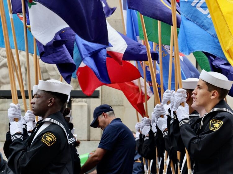 U.S. Naval Sea Cadets carry flags