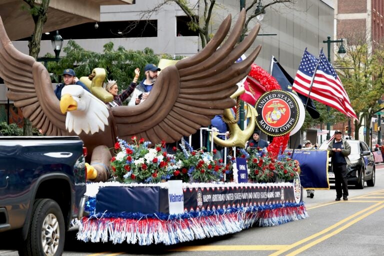 Miss Pennsylvania waves from the Marine Corps float