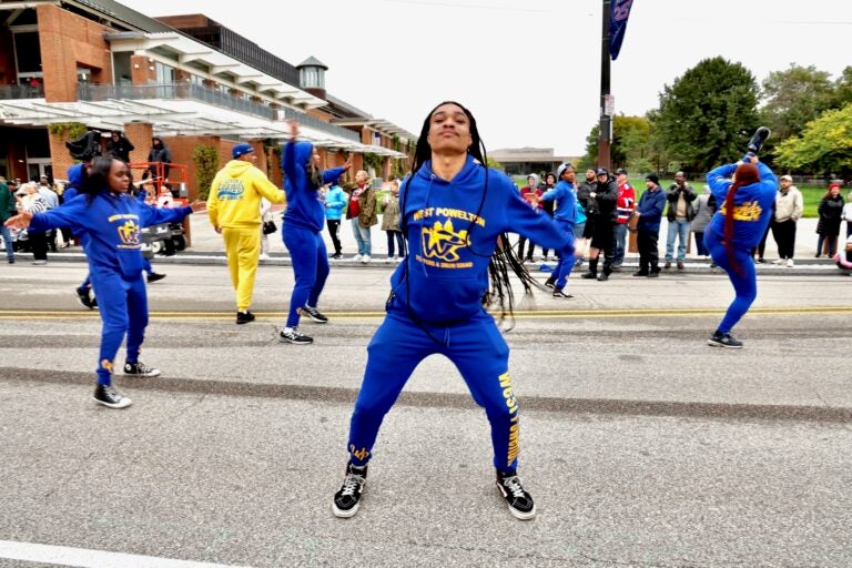 Members of the West Powelton Steppers and Drum Squad performing