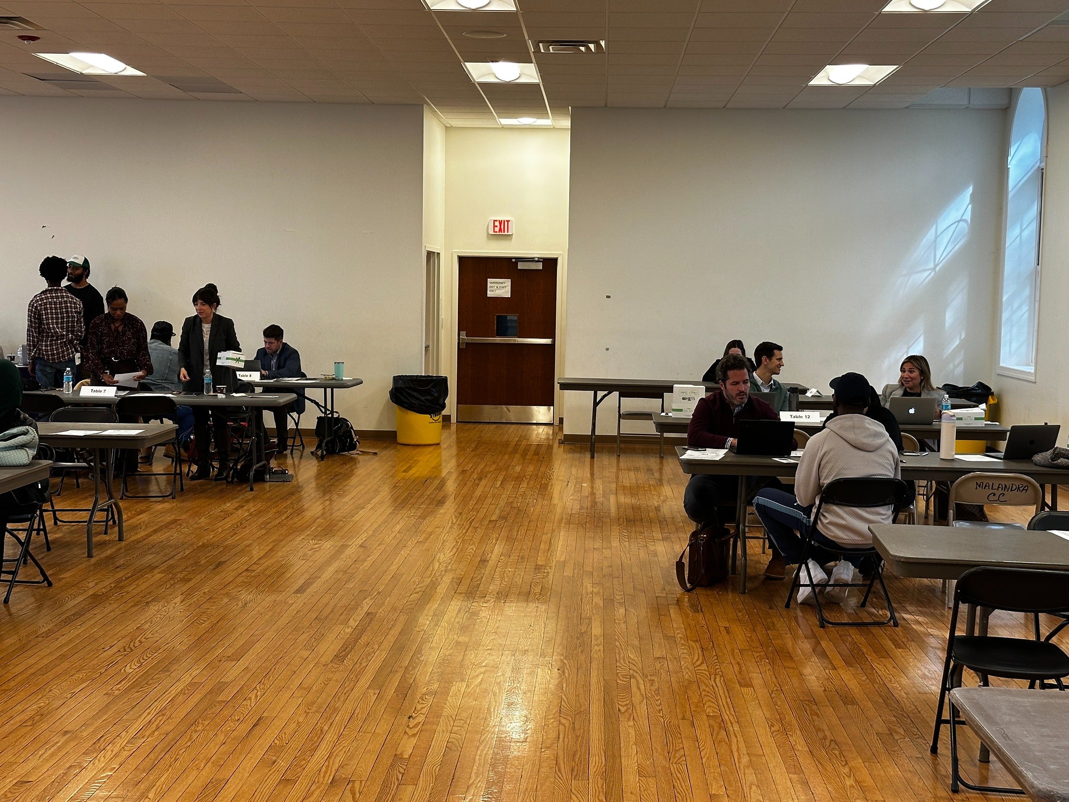 Lawyers volunteering to help some Camden residents obtain an expungement of their criminal record at a fai