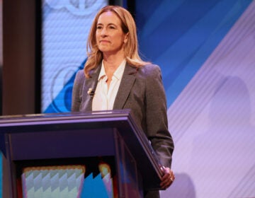 New Jersey Democrat Mikie Sherrill participates in a gubernatorial debate as she stands behind a podium