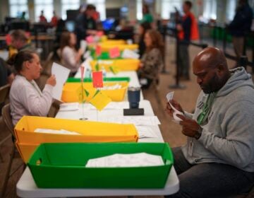 Election workers process mail-in ballots for the 2024 general election at the Chester County, Pa., administrative offices, Tuesday, Nov. 5, 2024, in West Chester, Pa.