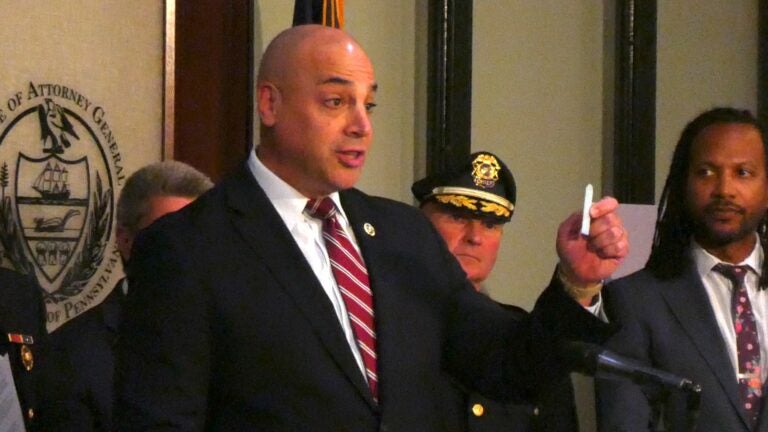 Dave Sunday speaking at a podium