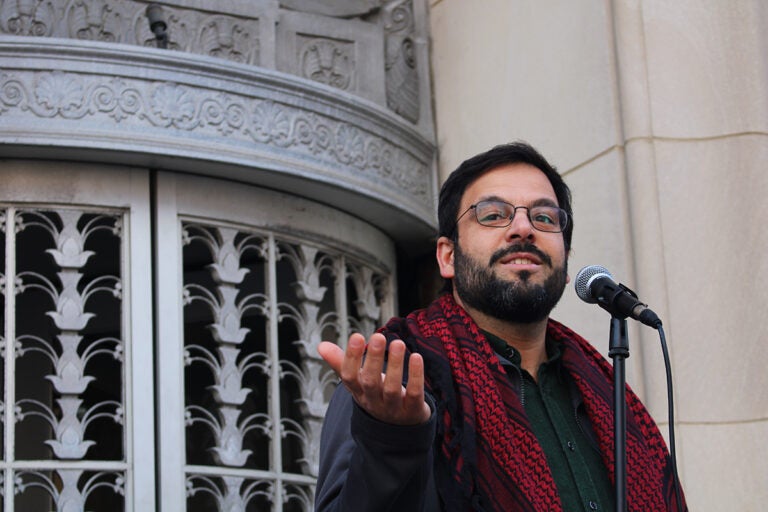 fridays-at-fettermans-5 Ahmet Selim Tekelioglu, executive director of CAIR-Philadelphia, speaks into a microphone outside of Sen. John Fetterman's Old City office