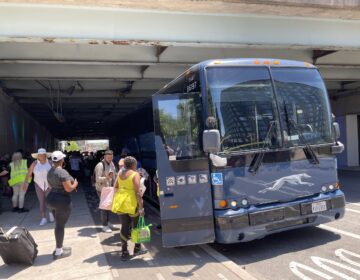 Passengers got on a Greyhound bus on Spring Garden Street