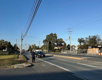 man-crossing-route-9-JPG-102325 Man attempting to walk across Route 9 highway