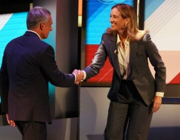 Republican Jack Ciattarelli (left) and Democrat Mikie Sherrill shake hands at the end of the final debate in the New Jersey governor's race, Wednesday, Oct. 8, 2025, in New Brunswick, N.J.