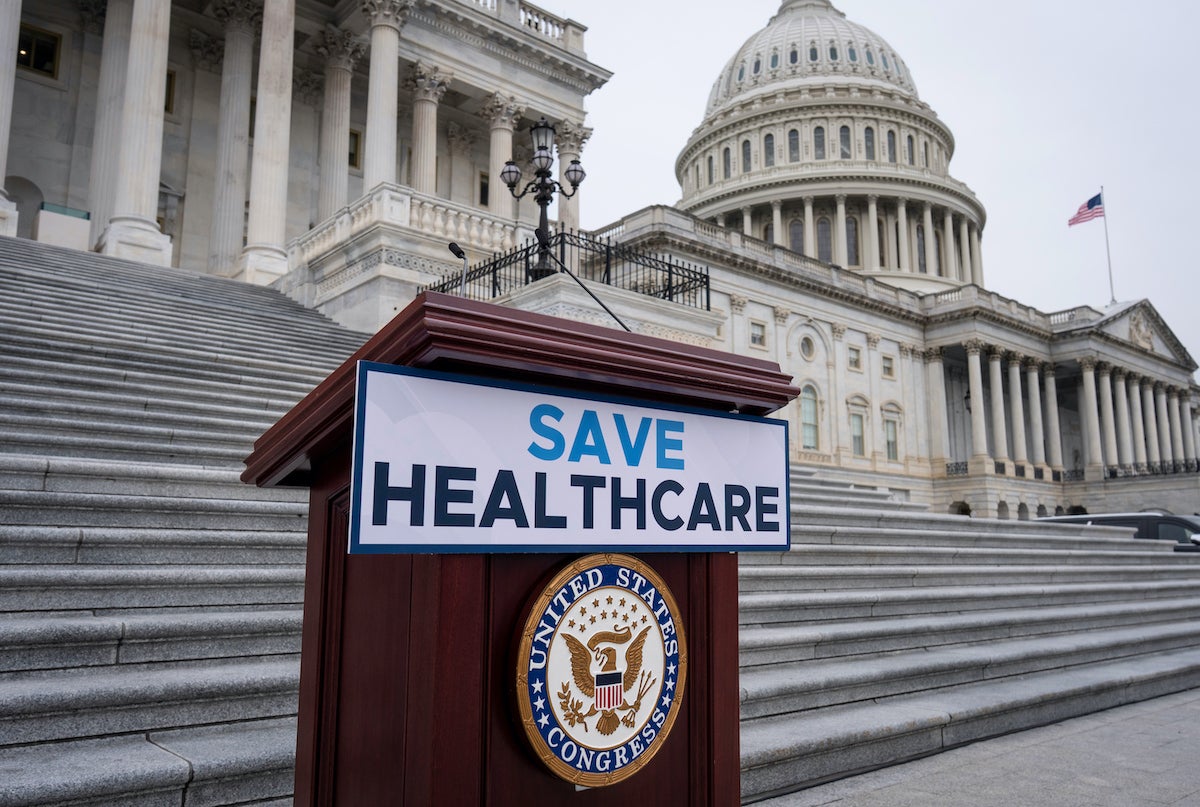 https://whyy.org/wp-content/uploads/2025/10/save-healthcare-sign-outside-us-capitol-ap-100225.jpg
