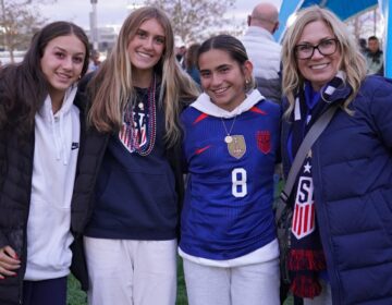 Four women posing for a photo