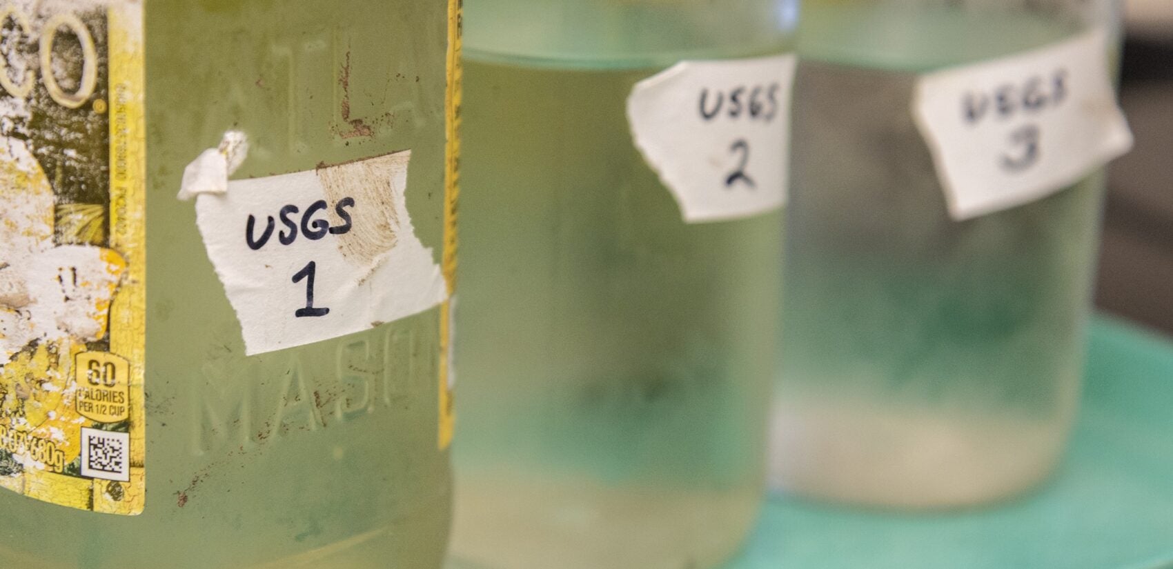 three water samples in bottles