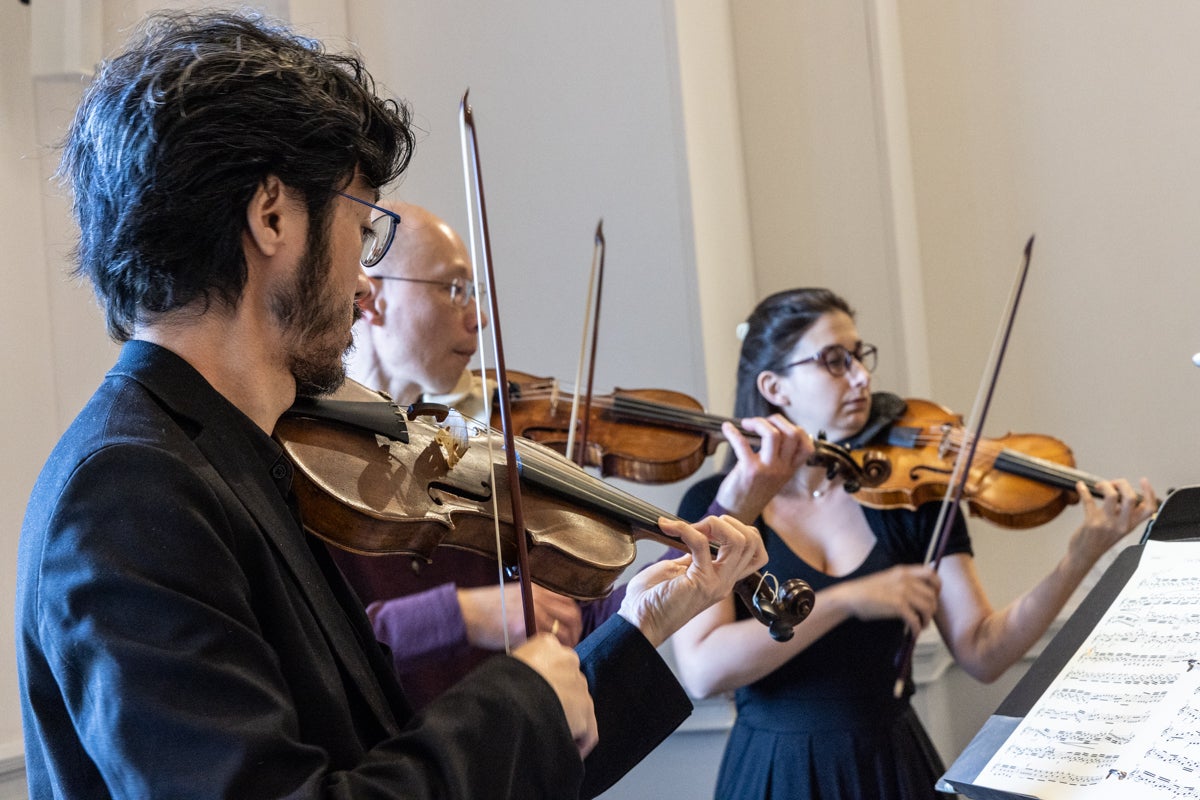 The Tempesta di Mare Baroque orchestra violins rehearsing