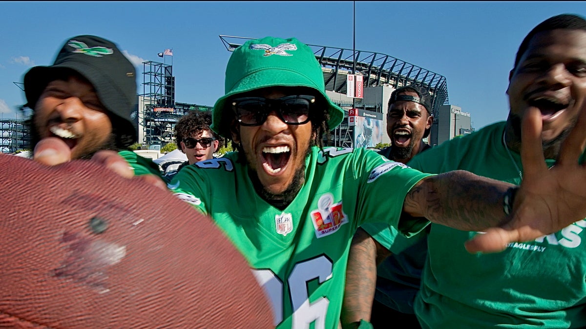 Eagles fans yelling into the camera
