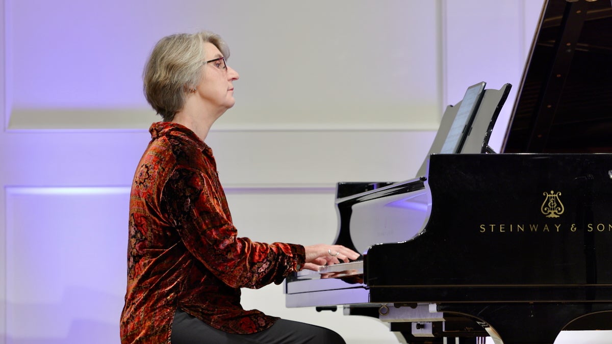 Pianist Jennifer Blyth playing piano