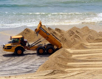 Atlantic_City_Casinos_Beach_Erosion_ap-2024-03-19-file Sand dunes on the beach and a work vehicle