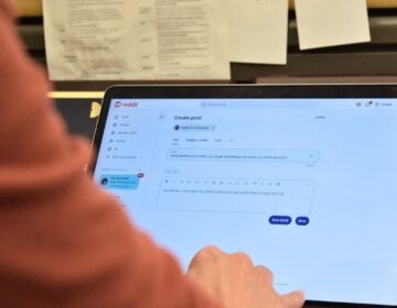 Users on social platforms like Reddit are being accused of using AI to write posts. (Nichole Currie/WHYY)