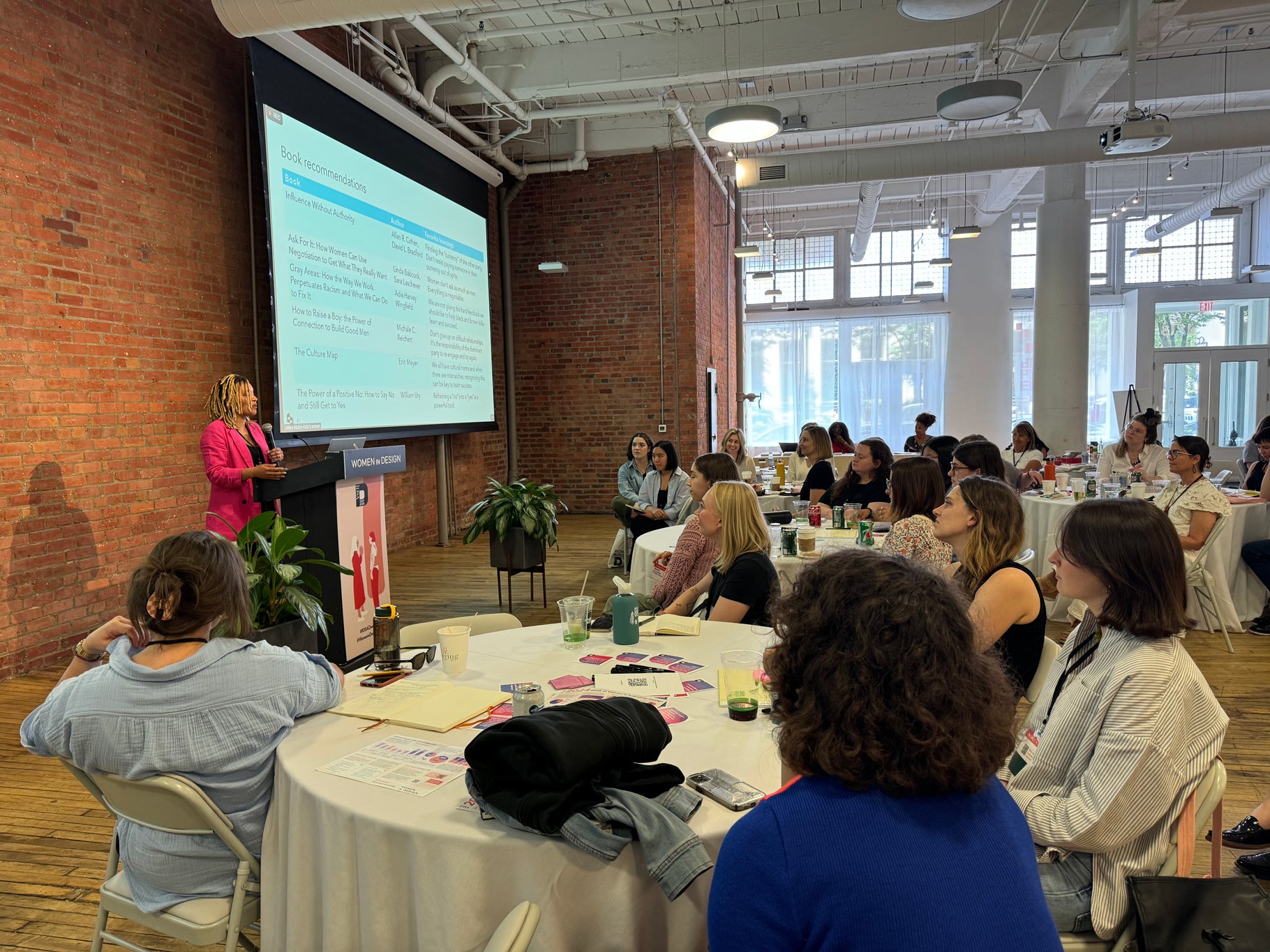 Diona Murray speaking at an event.