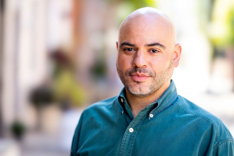 Congressional candidate Pablo McConnie-Saad in a blue shirt