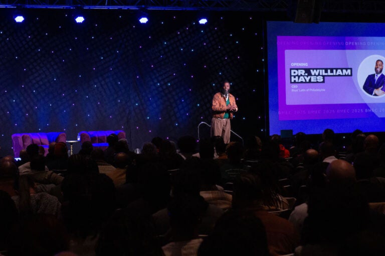 Dr. William Hayes speaks onstage