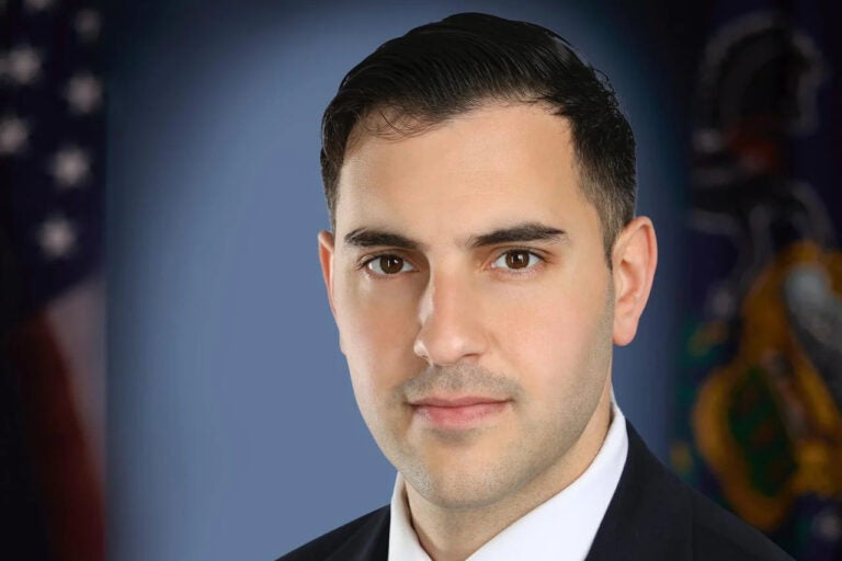 Danny Ceisler looks on