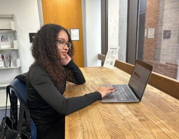 Jenaya Vann at her computer